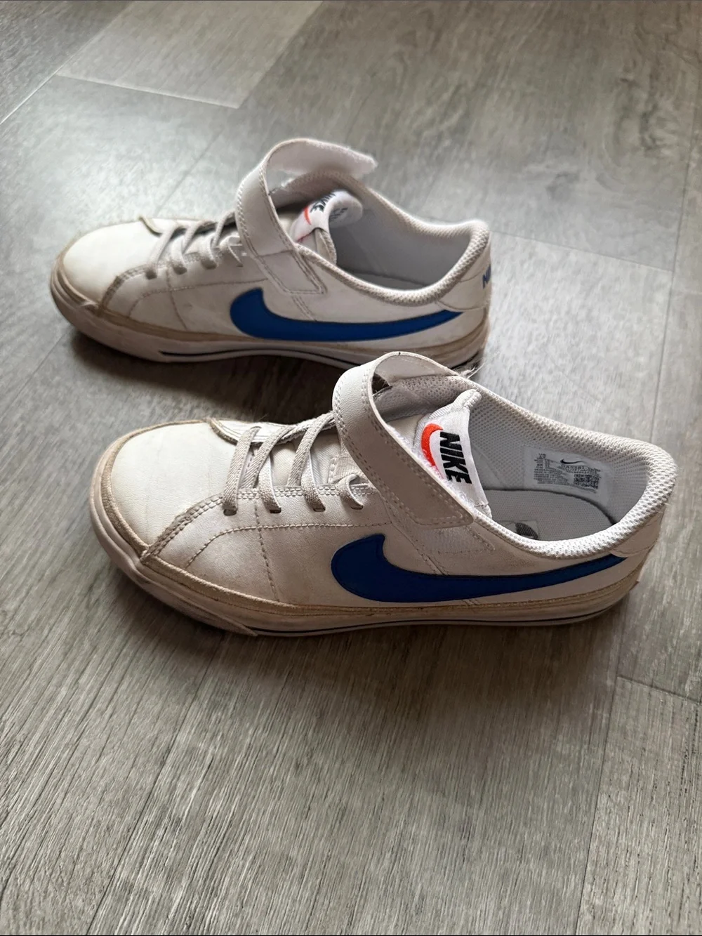 Nike Kids White Sneakers with Blue Swoosh